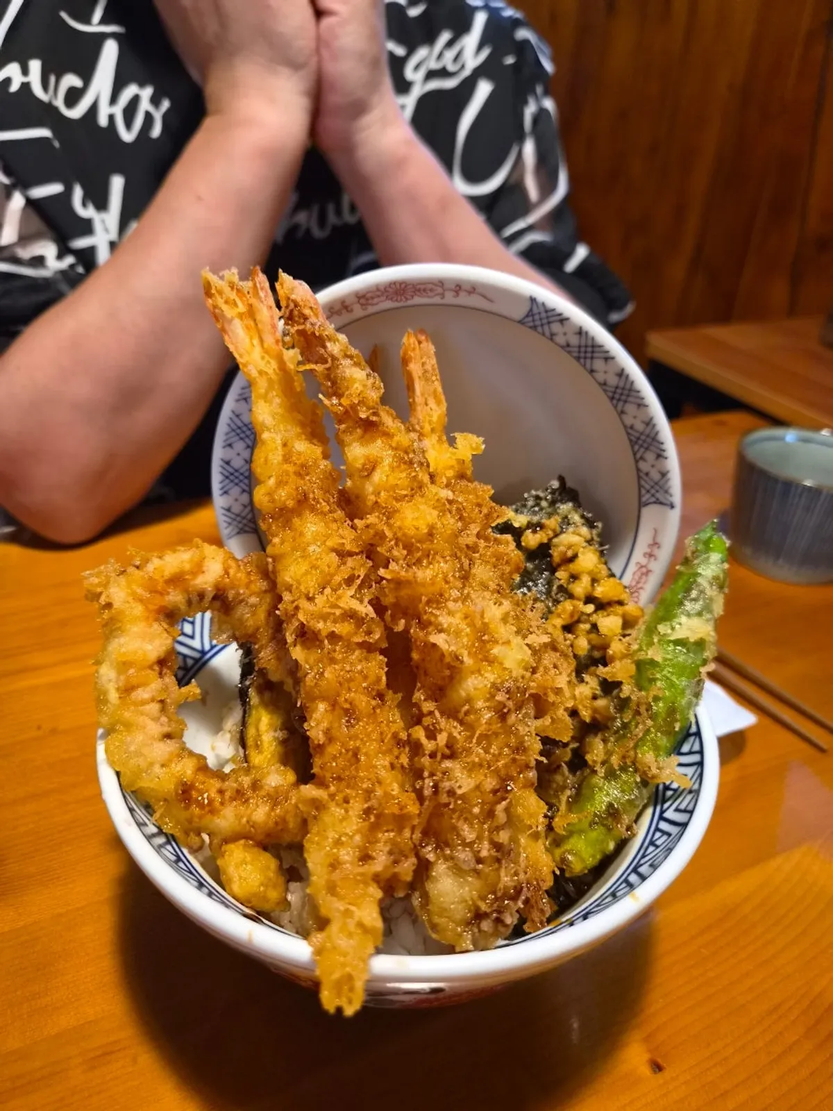 Tendon rice mixed with egg and the tempura set aside