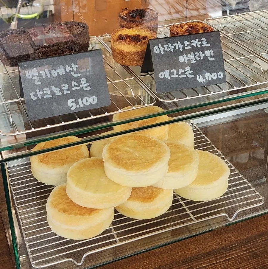 A pile of naturally fermented English muffins