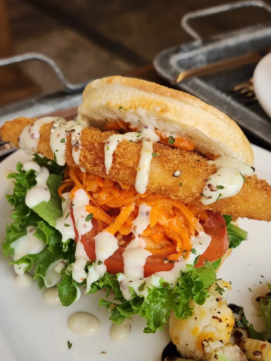 Fish cutlet sandwich with domestic cod cutlet and carrot slaw