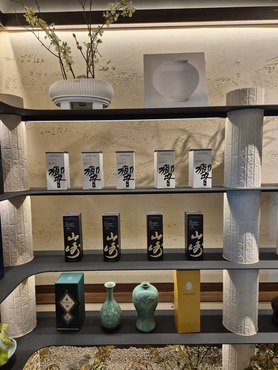 Premium liquor bottles displayed at Gukbo Garden Samsung Main Branch