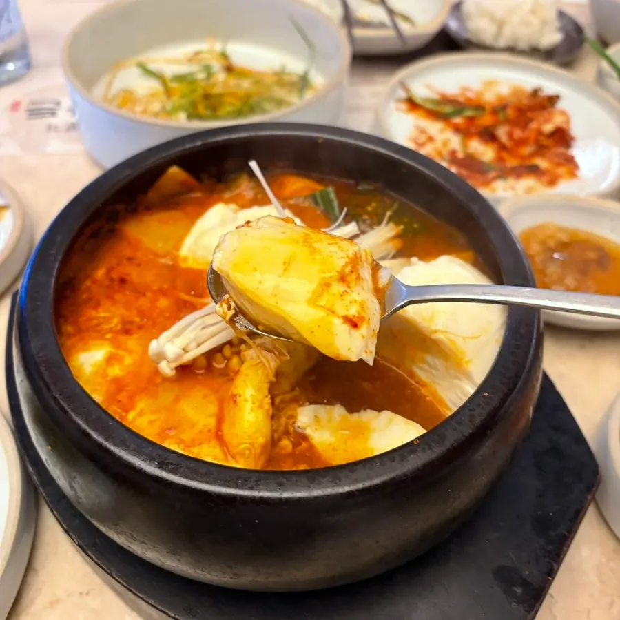 Full meal spread served with the sundubu-jjigae