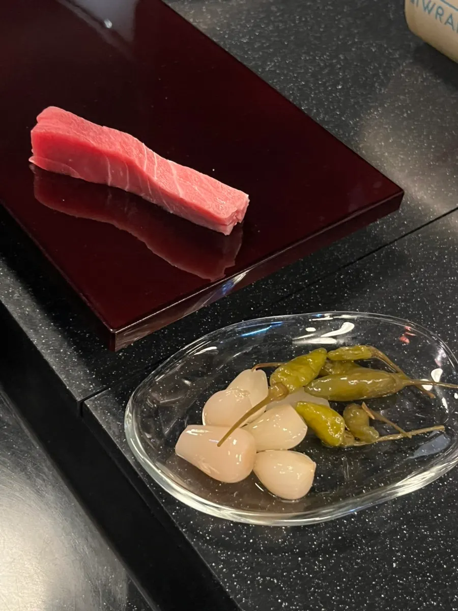 Large tuna sashimi given separately by the owner