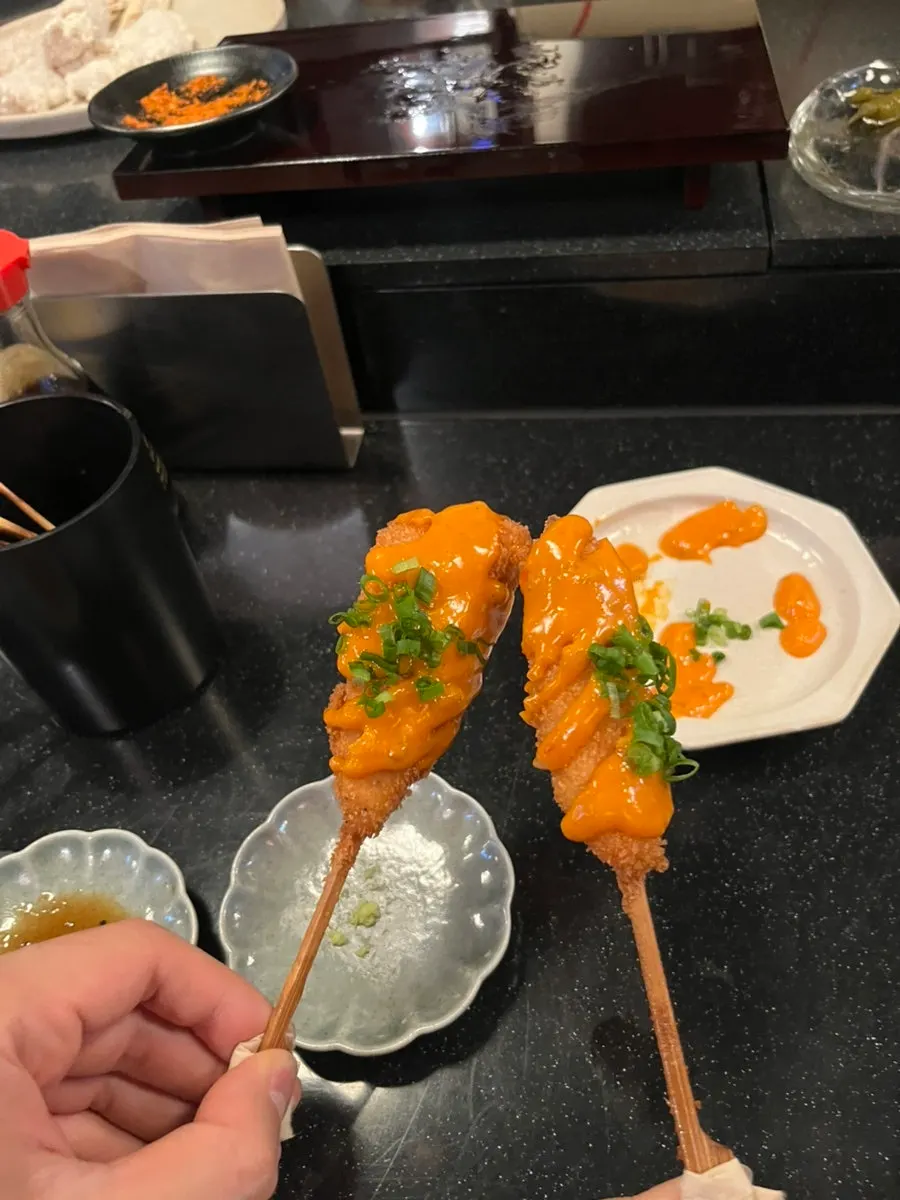 Fourth skewer topped with an exotic sauce