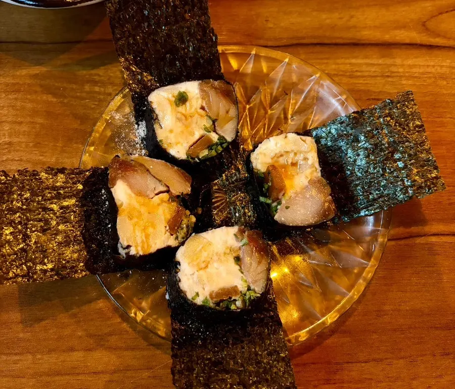 Basic banchan of seasoned tot, seasoned cucumber, and baek-kimchi