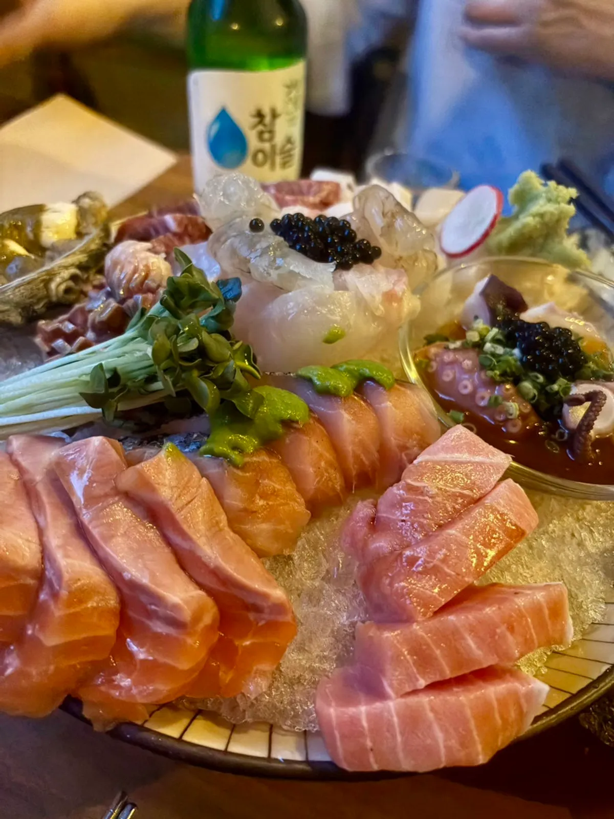A sashimi platter with salmon, tuna, flounder and more
