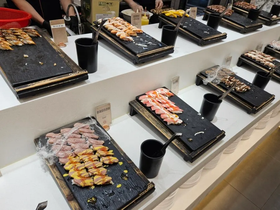 Sushi corner stocked with many varieties
