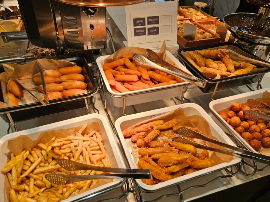 Corner with fried food and desserts