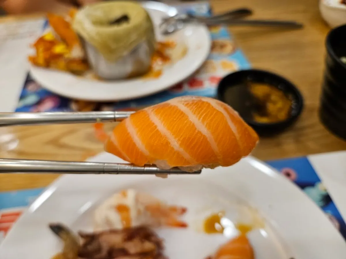 A plate of sushi brought back to the table