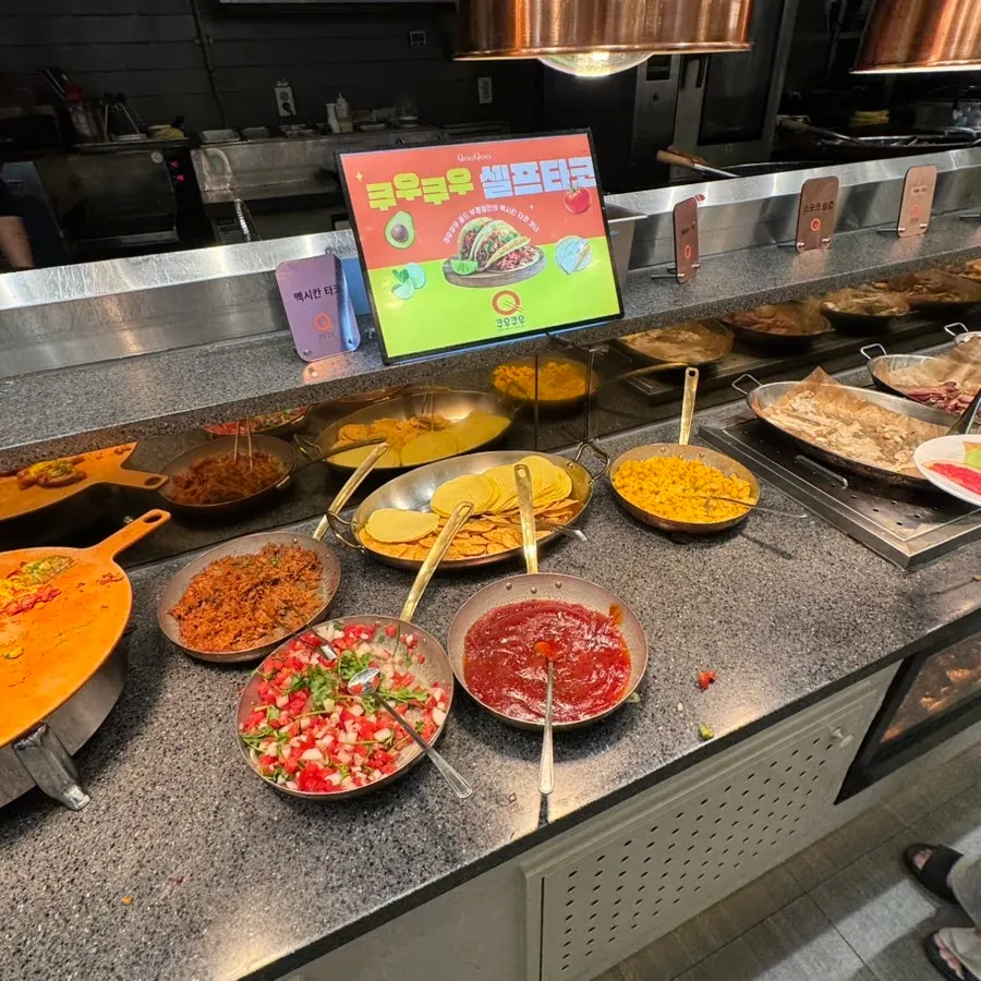 Ingredients displayed at the self-serve taco corner