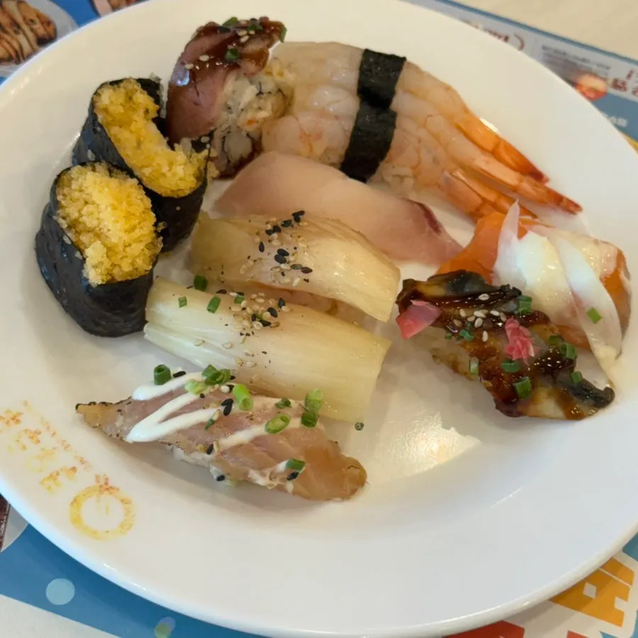 Second plate with flying fish roe gunkan and aged kimchi sushi
