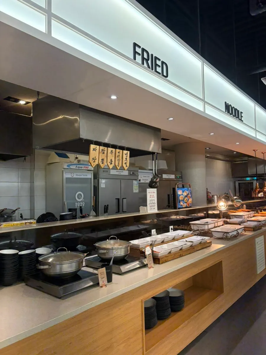 Buffet corner with fried dishes and cooked food