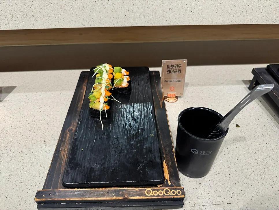 Seafood dishes laid out along the buffet line