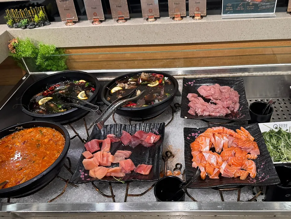 Plate of thick flounder, salmon and botan shrimp sushi