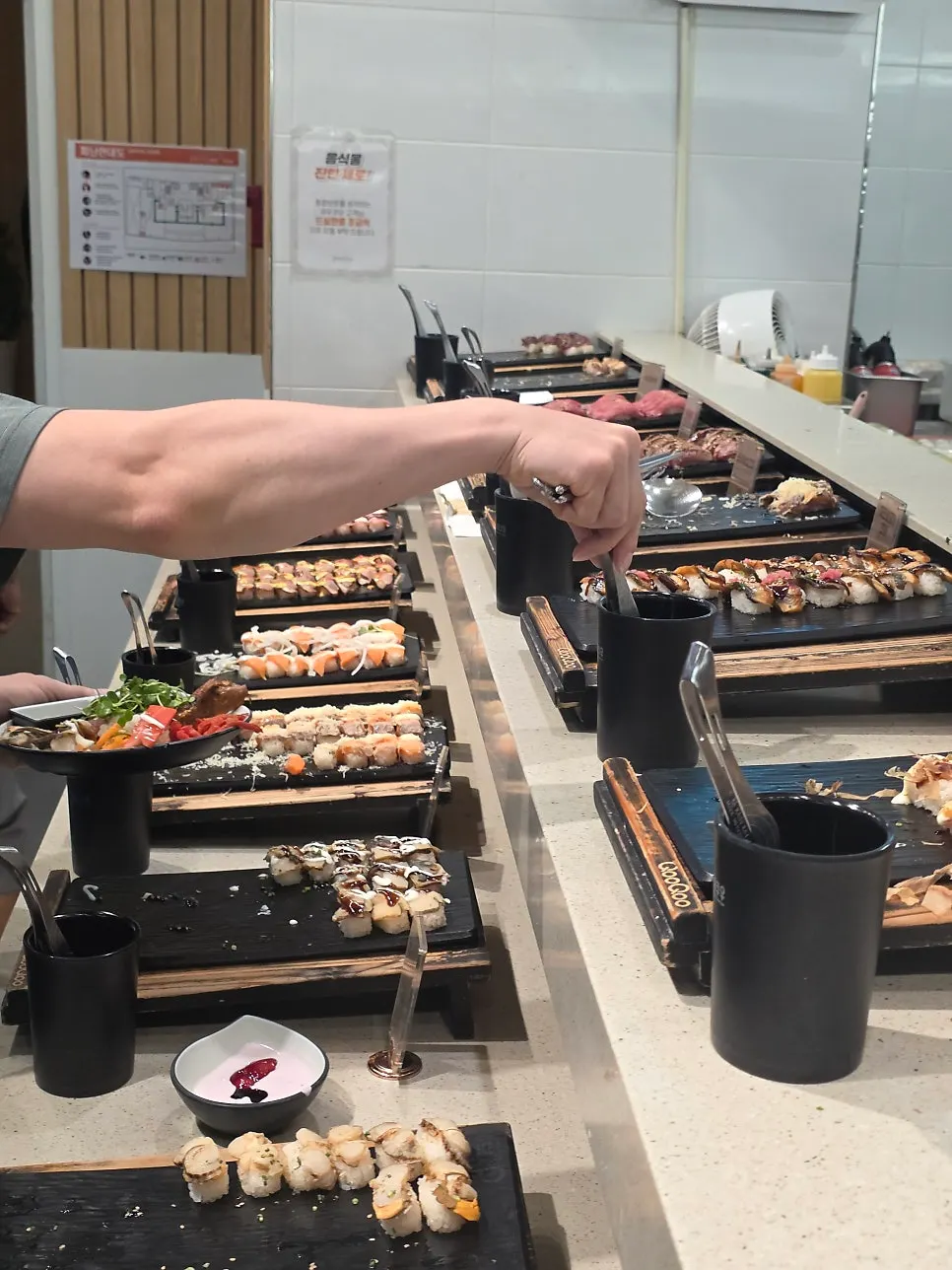 Display case with various sushi types