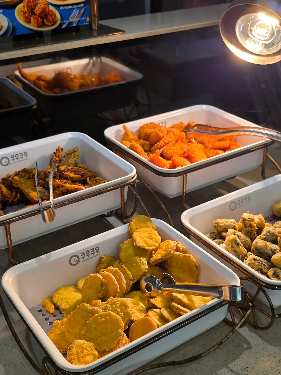 Hot food corner with pork ribs and meat dishes