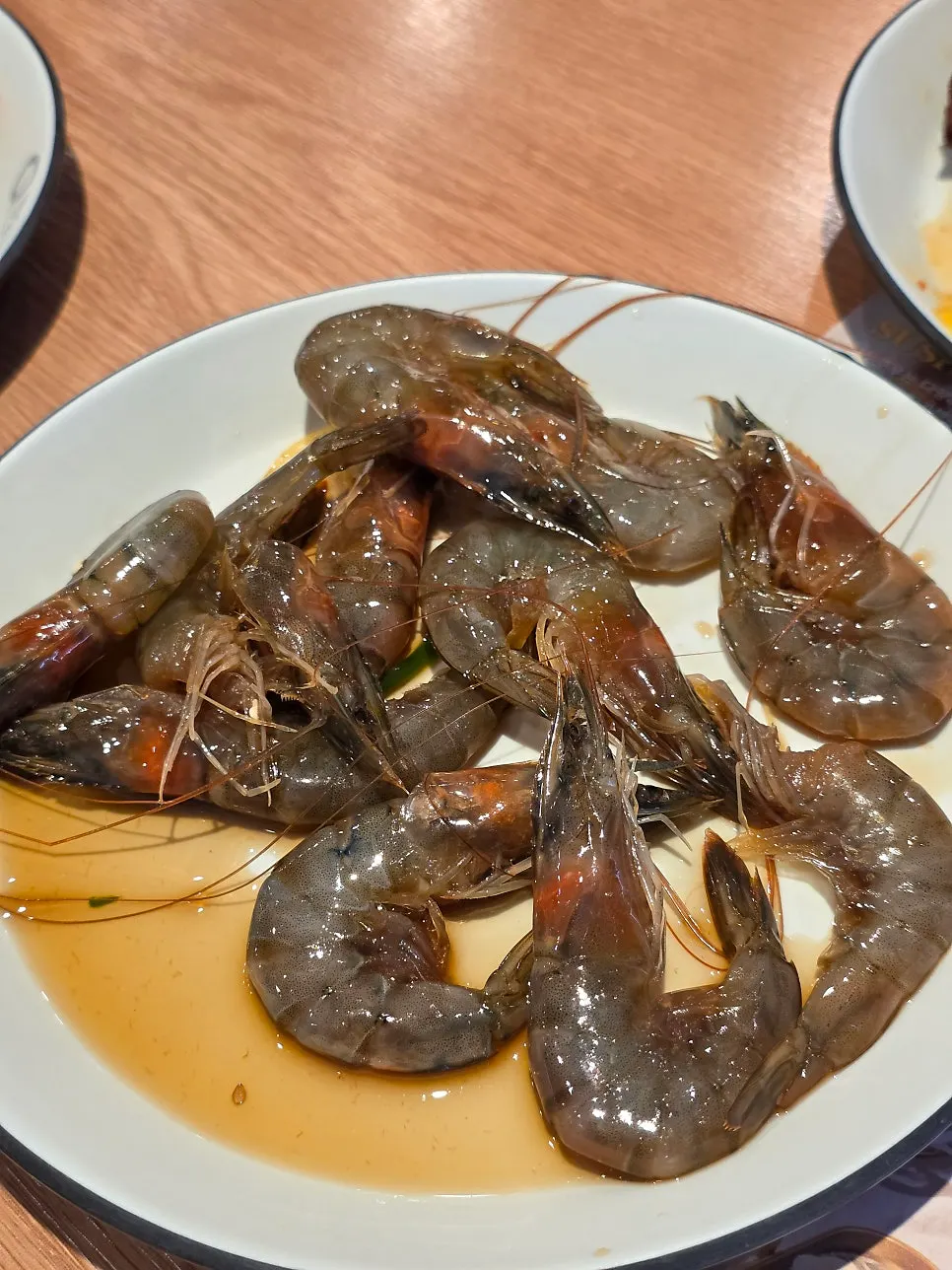 Plate piled high with soy-marinated shrimp