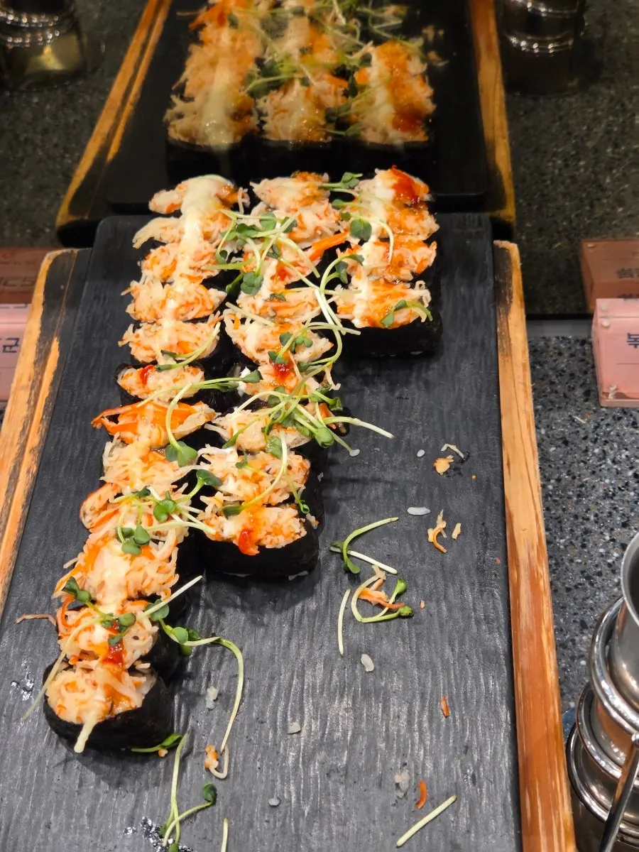 A plate with a mix of sushi varieties