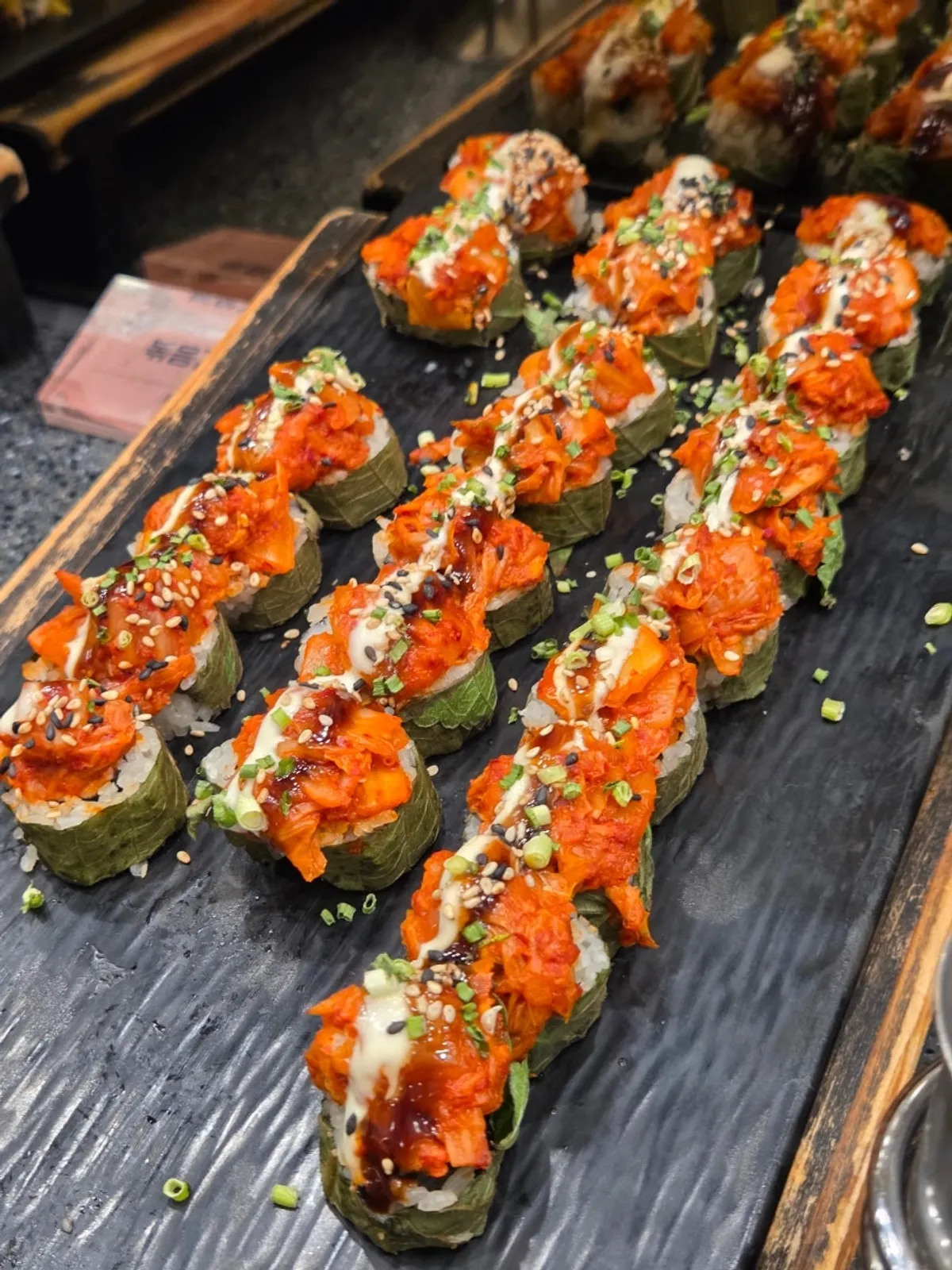A plate of sushi including gamtae sushi
