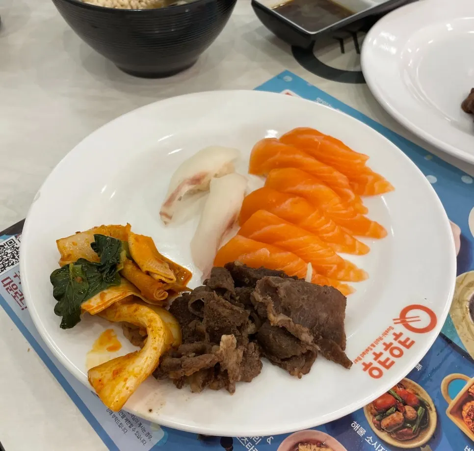 Buffet plate with sushi and rolls together