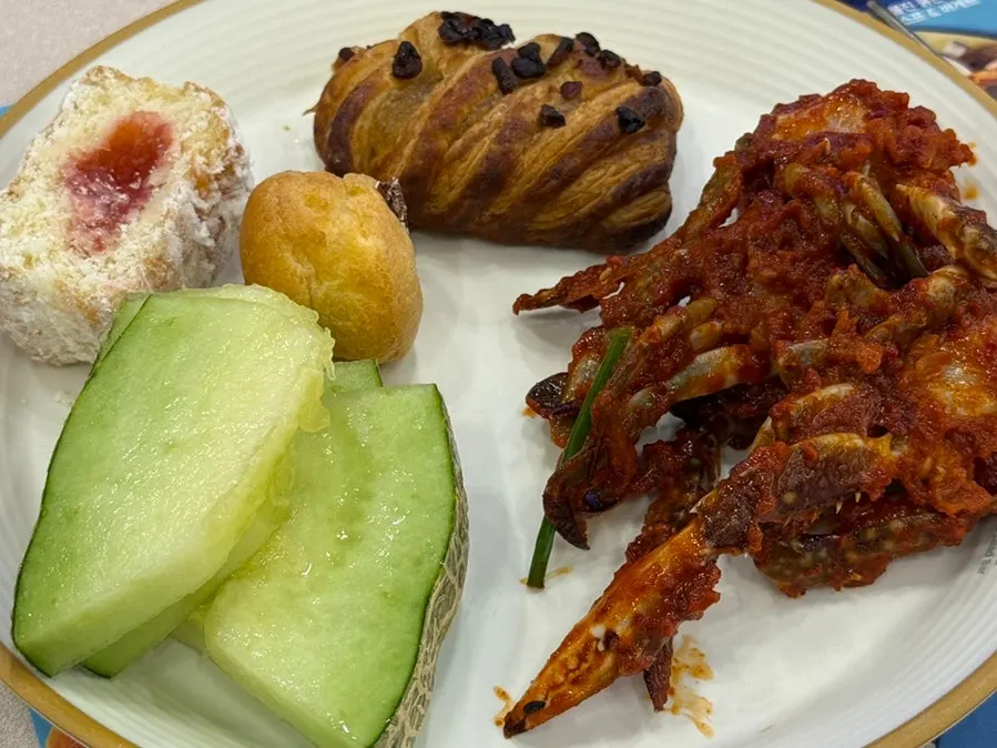A plate with sushi and grilled items for the final course