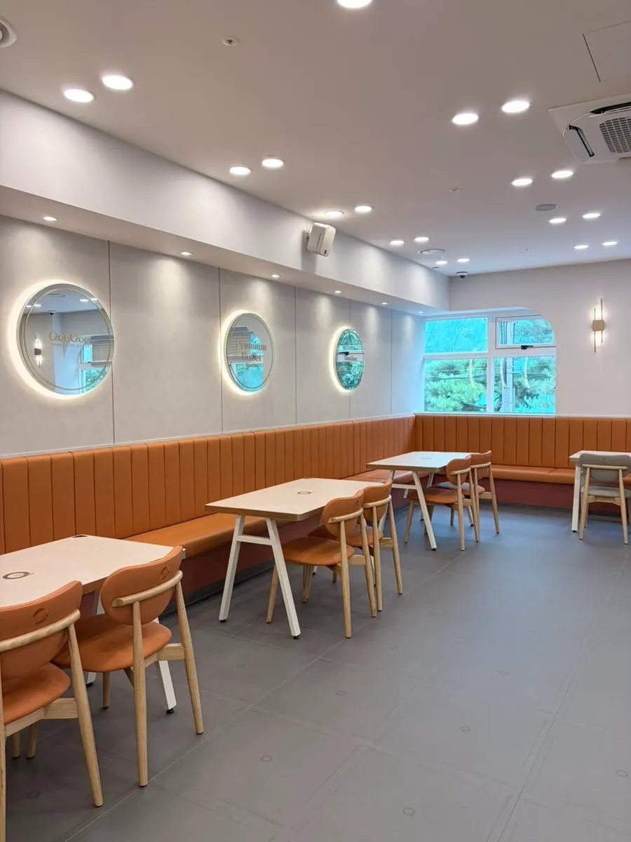 Brightly lit buffet interior and tables