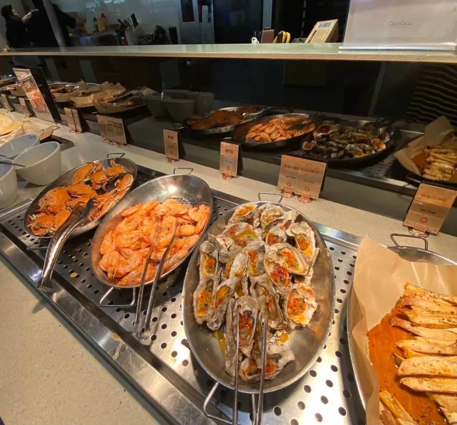 Smoked duck and other hot food on display