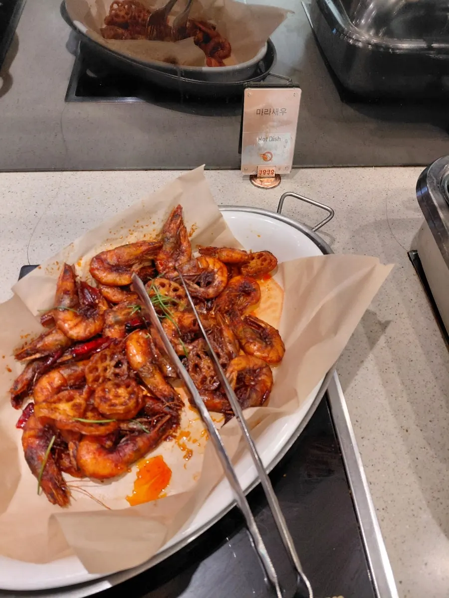 A plate of buffet food from Kuu Kuu Nowon Branch