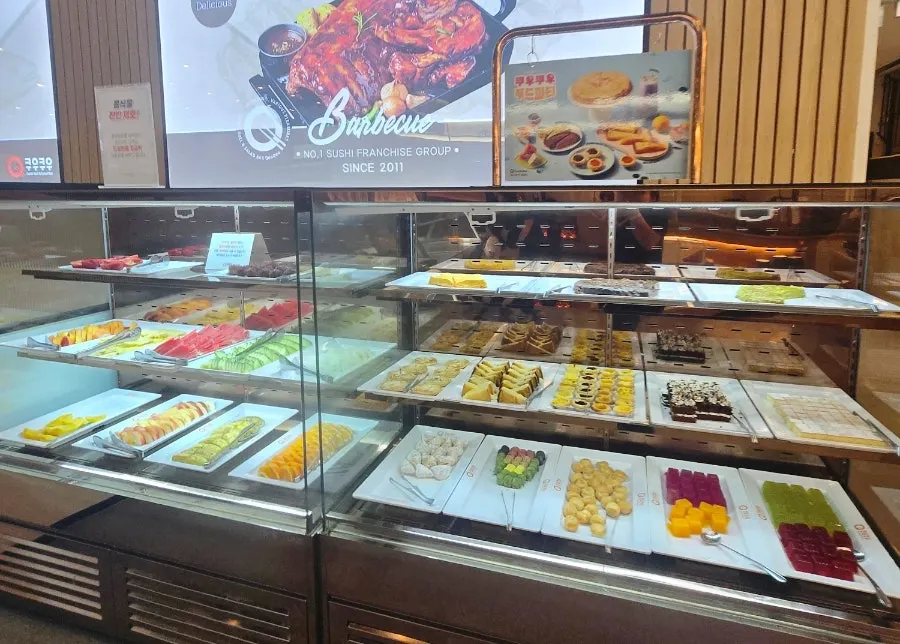 Salad corner with fruit, salads and side dishes