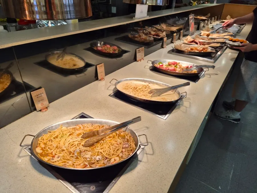 A display of meat dishes including smoked pork shoulder-neck