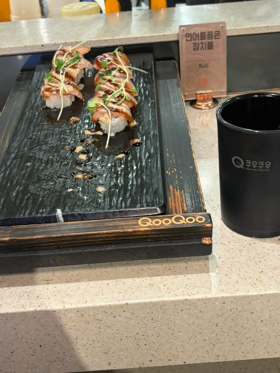 Shrimp roll and sizzling beef belly roll display