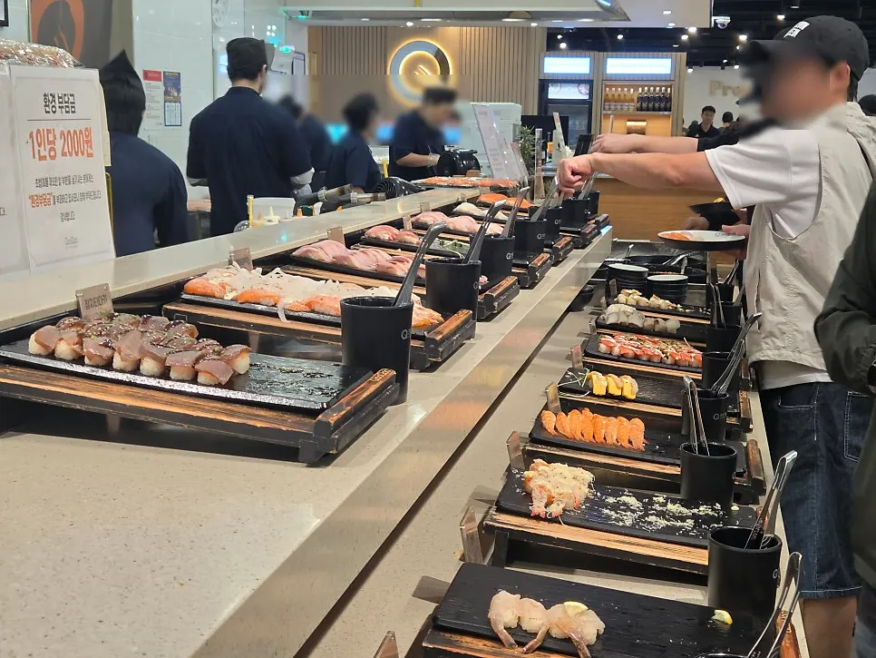 Sushi displayed at the all-you-can-eat sushi station