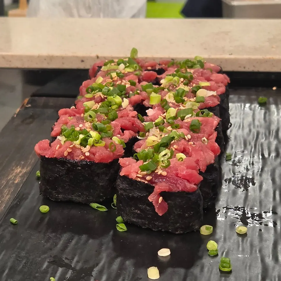 Unseasoned yukhoe gunham (raw beef in a seaweed boat)