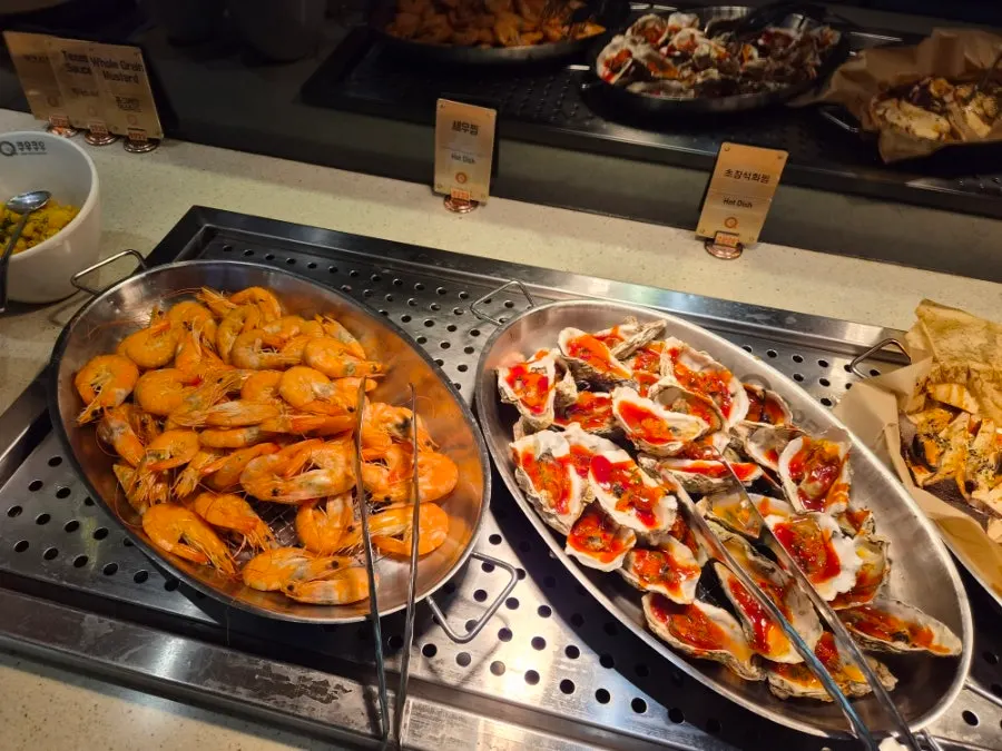 A buffet plate filled with hot food