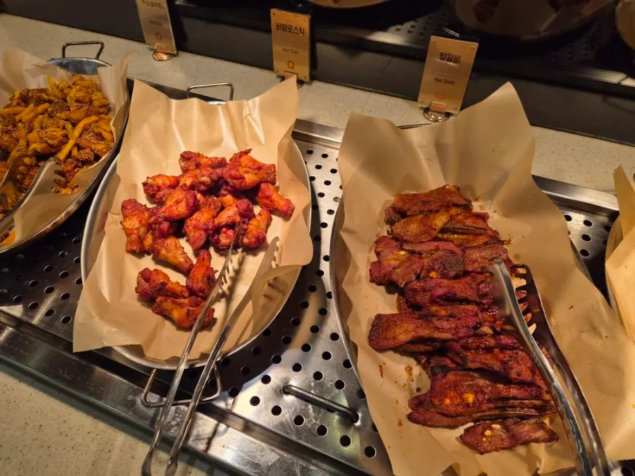 A dining table with hot food dishes