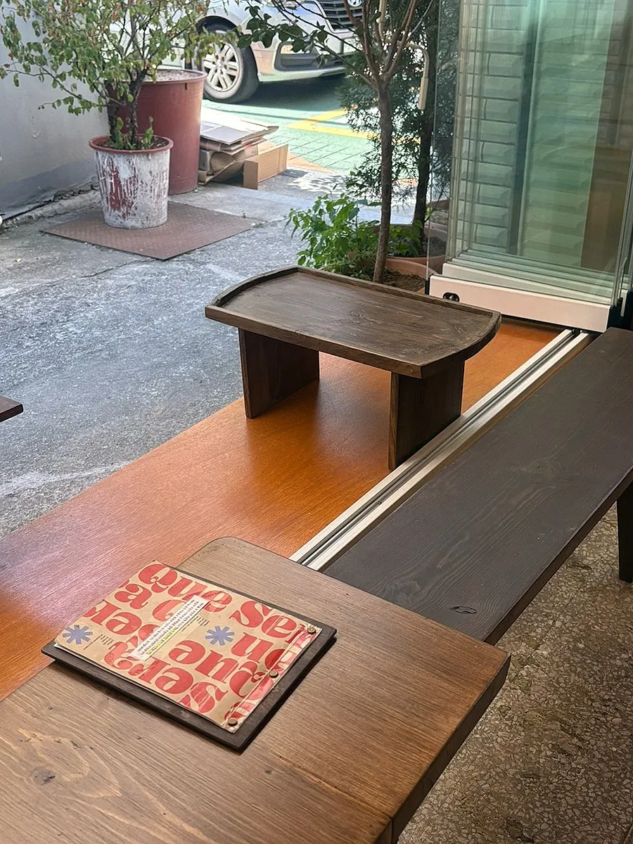 Tables and seating inside Que Sera