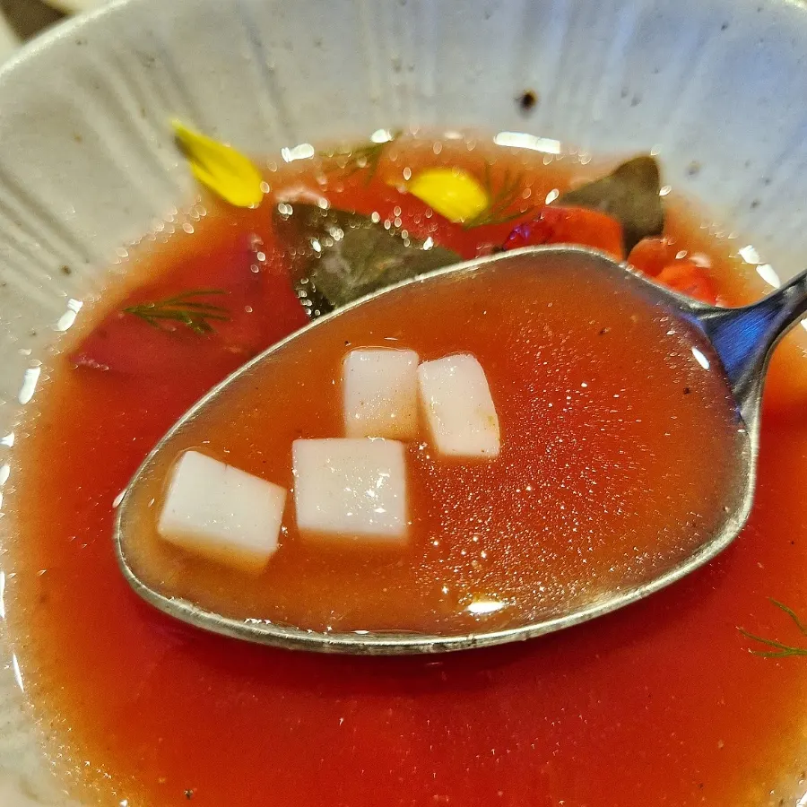 Plating of watermelon and squid gazpacho
