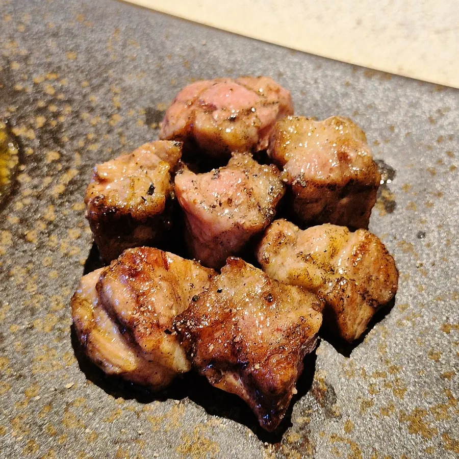 Cross-section of grilled Iberico pork neck