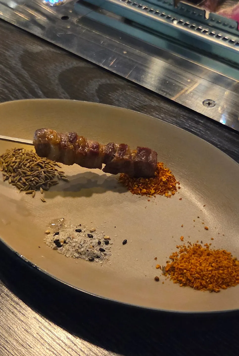 Lamb skewers on the automatic rotating grill