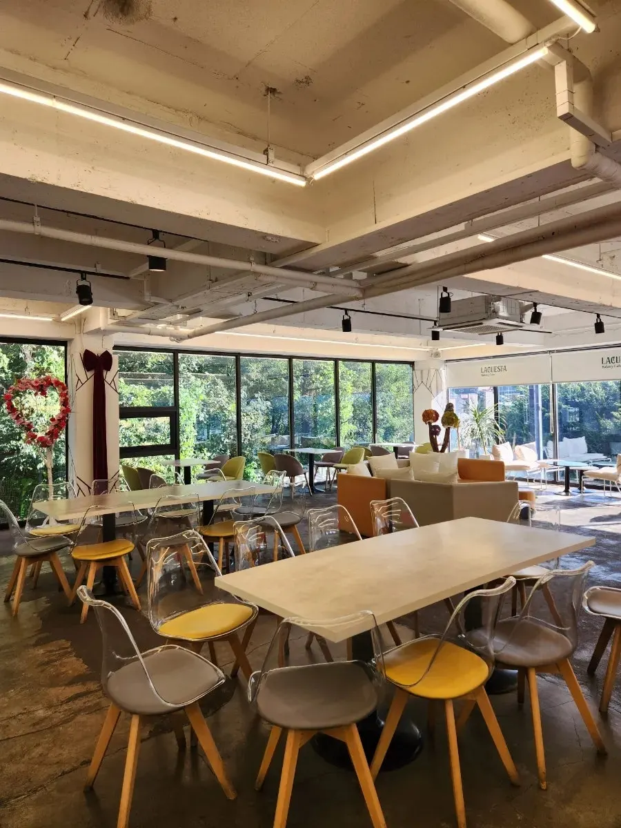 1st floor interior with high ceiling and floor-to-ceiling windows