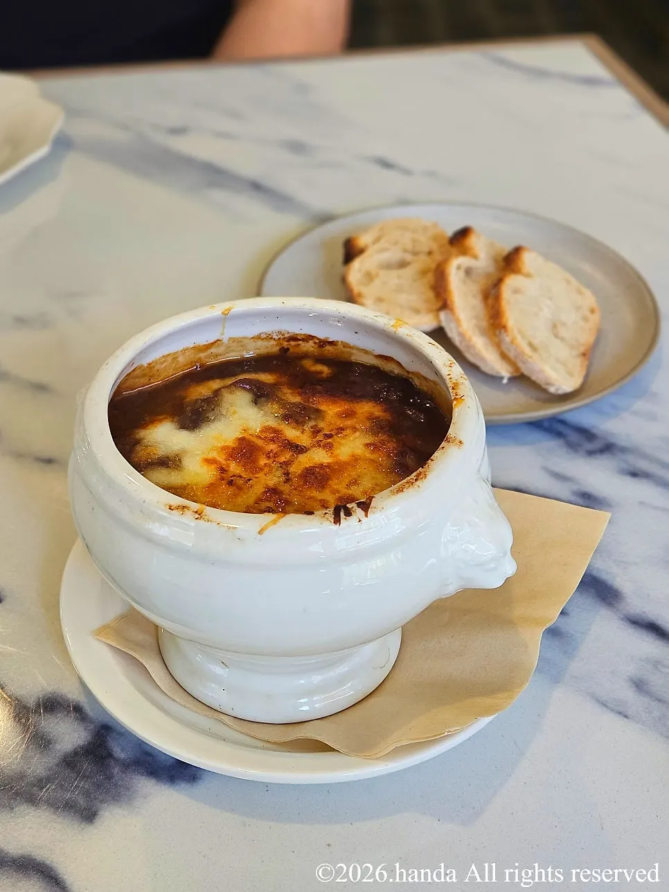 A bowl of LA RUELLE's onion soup