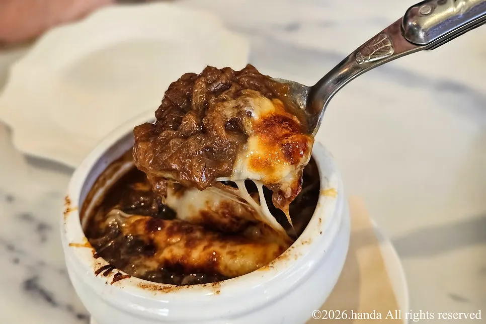Onion soup topped with Gruyère cheese