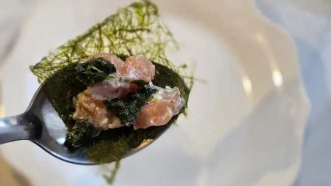 Salmon tartare topped with gamtae and caviar