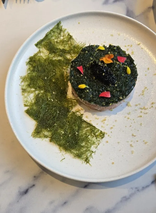 Close-up bite of the salmon tartare
