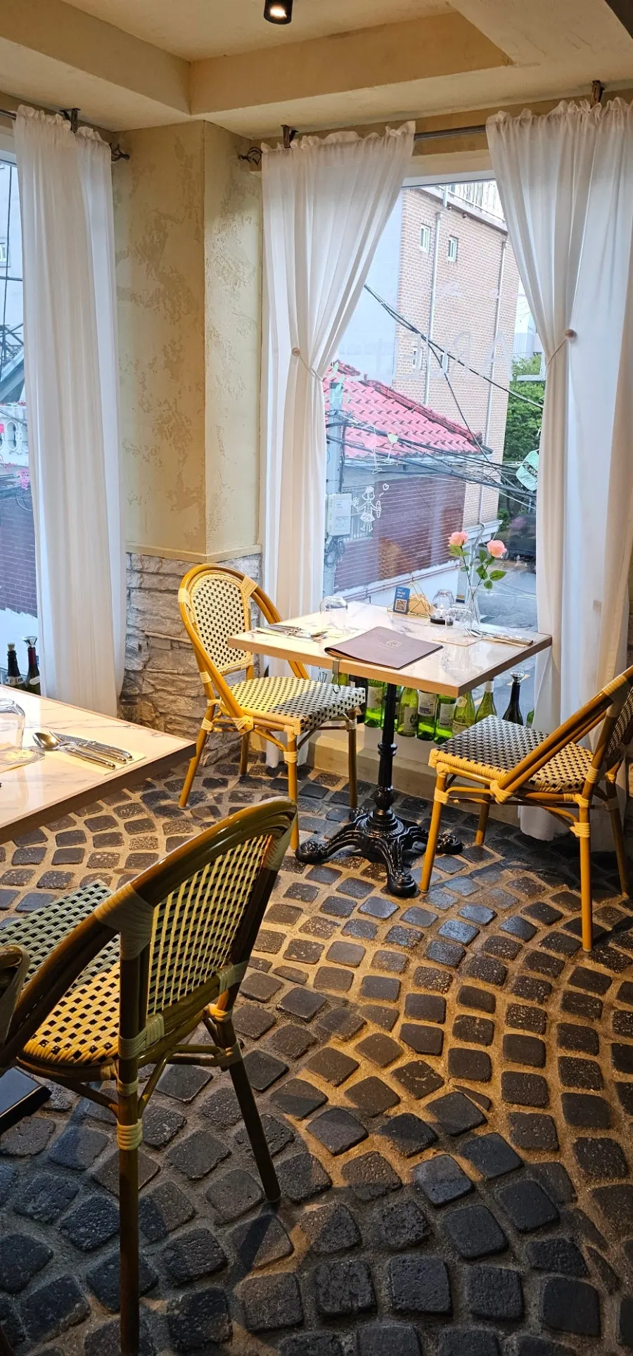 Full view of LA RUELLE's interior with a French atmosphere