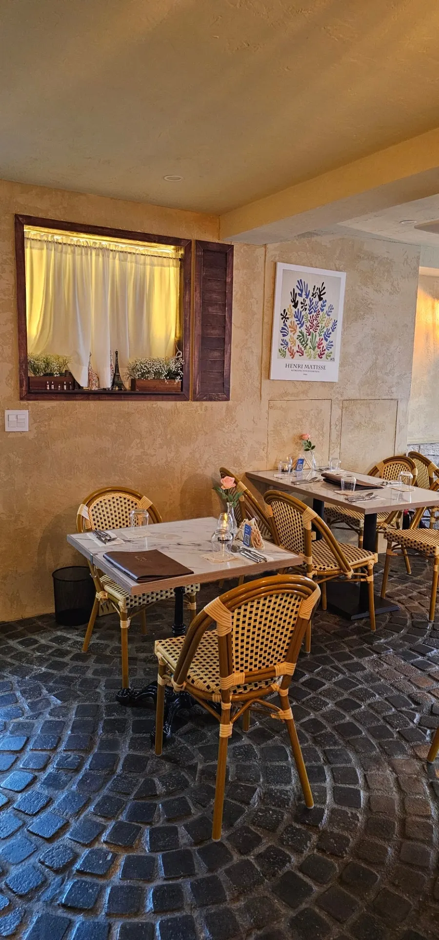 Floor tiles and seating at LA RUELLE