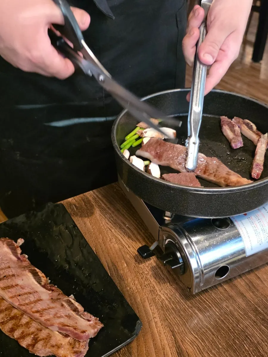 LA flower rib being grilled at the table