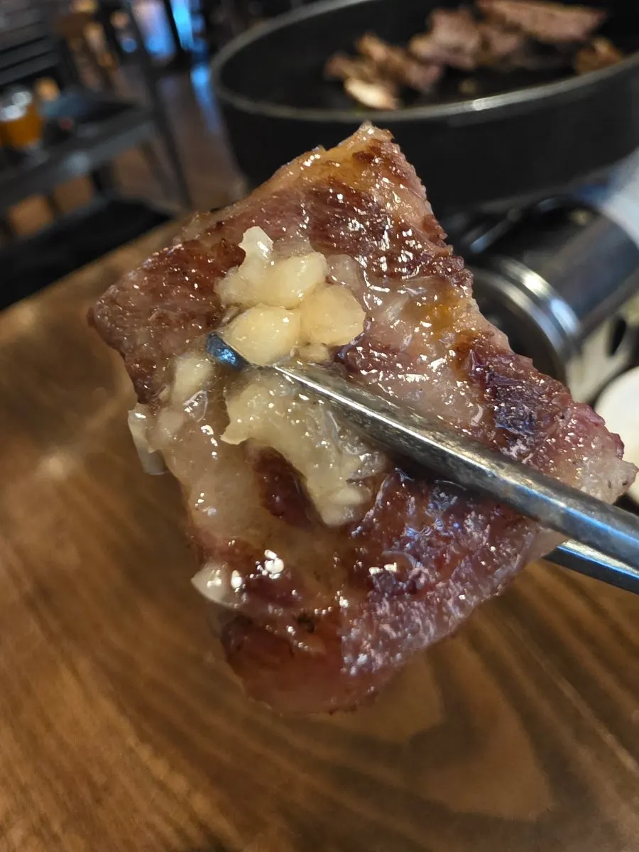 A bite of Raviok flower rib enjoyed as a wrap