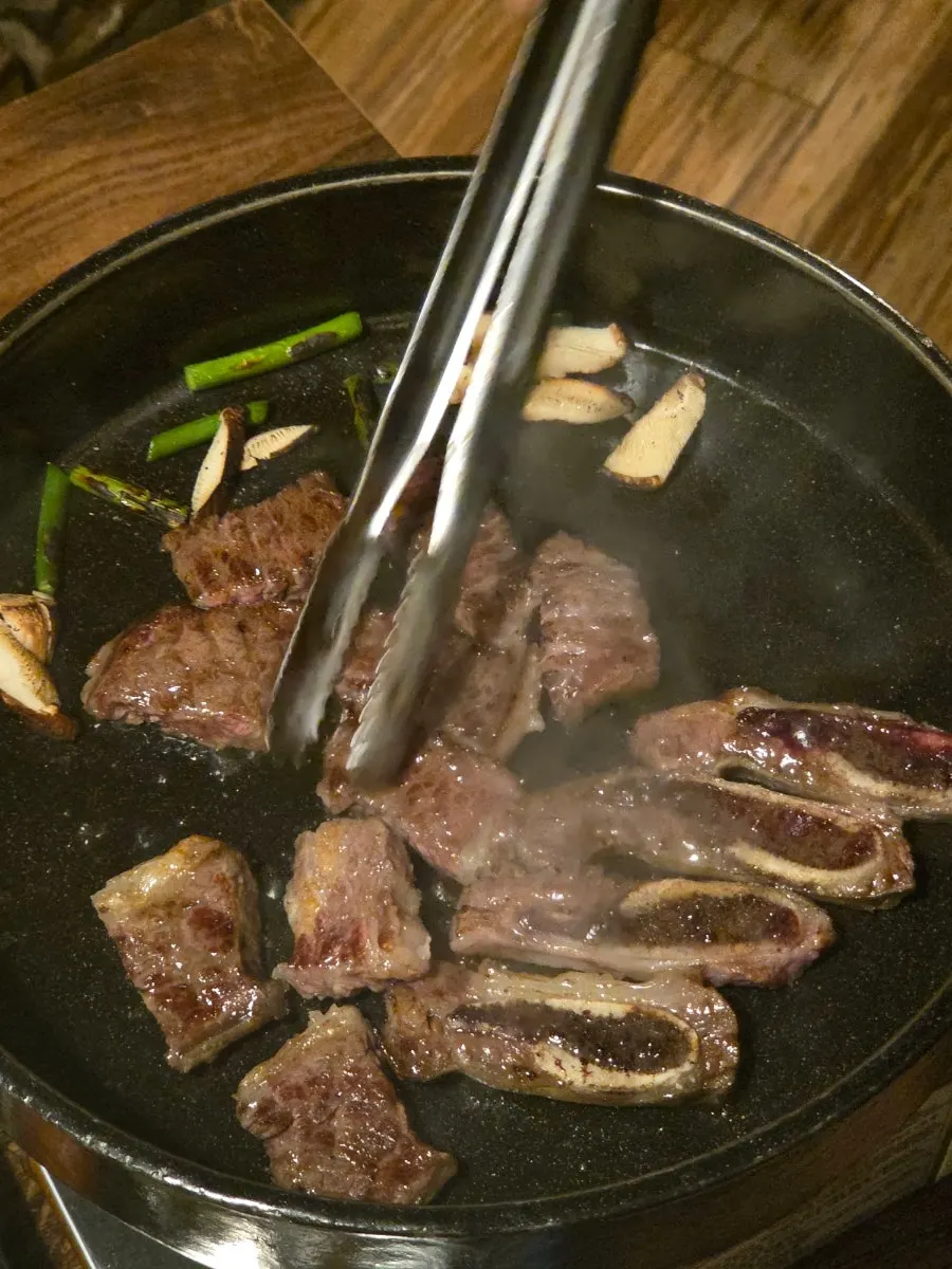 The final char-finished grilled meat