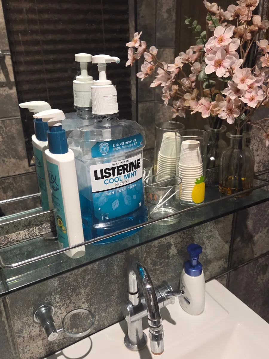 Mouthwash and floss provided in the restroom