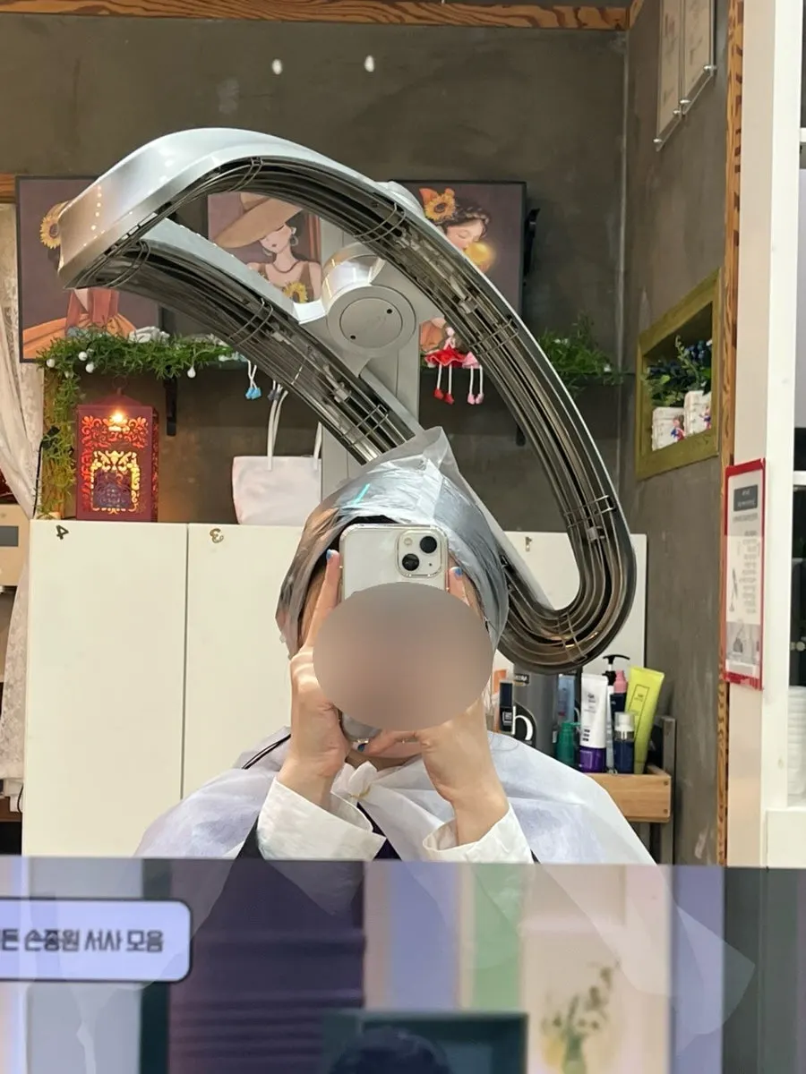두피 영양 도포 후 열처리 중인 모습